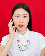 Nekos fishing for Kois Necklace