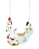 Nekos fishing for Kois Necklace