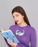 Granny Dino reading to her Grand-Dinos Upside Down Edition Necklace
