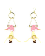 Hanging-trapeze-artist-earrings-la-vidriola-plastic-jewellery-circus-where-the-magic-happens-detail