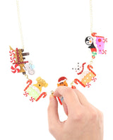 Santas-animal-friends-choo-choo-pastel-train-necklace-Christmas-2020-la-vidriola-detail-changing