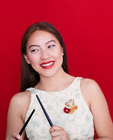 Shiba and their Taiko Drum Brooch