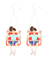 Tickle-the-sky-with-your-toes-on-this-flying-swing-earrings-ticket-to-playland-la-vidriola-detail