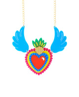Wearing My Milagro Heart on my Sleeve Necklace