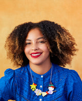 Witchy Hello Kitty on a broom necklace