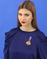 Magic potion brooch