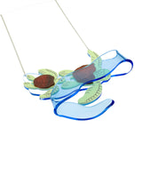 Turtles Surfing The Current necklace