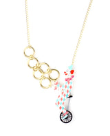 Clown-riding-a-unicycle-necklace-la-vidriola-plastic-jewellery-circus-where-the-magic-happens-detail