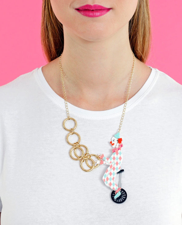 Clown-riding-a-unicycle-necklace-la-vidriola-plastic-jewellery-circus-where-the-magic-happens-product