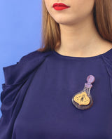 Magic potion brooch