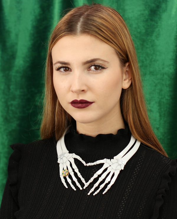 Skeleton hands necklace