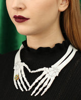 Skeleton hands necklace